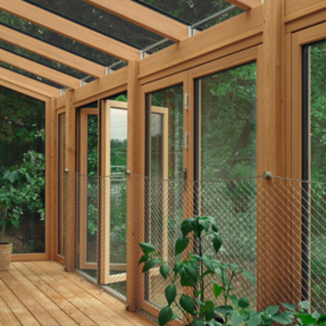 La baie accordéon Woodline en bois massif